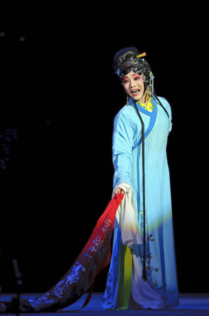 CHENGDU - JUN 4: chinese Sichuan opera performer make a show on stage to compete for awards in 25th Chinese Drama Plum Blossom Award competition at Xinan theater.Jun 4, 2011 in Chengdu, China.Chinese Drama Plum Blossom Award is the highest theatrical awaのeditorial素材