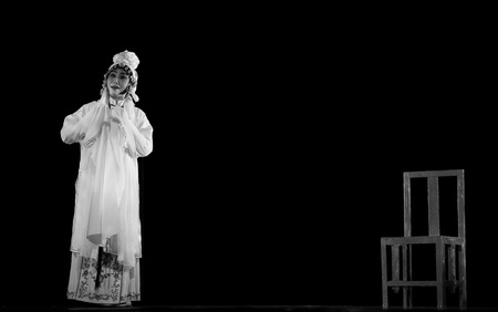 CHENGDU - SEPT 29: chinese famous opera artist Tian Mansha performs Concept opera Sigh on stage at JinSha theater Sept 29, 2011 in Chengdu, China.のeditorial素材