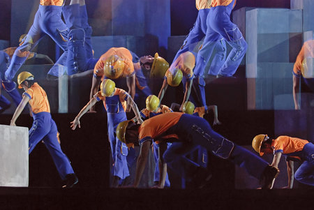 CHENGDU - DEC 16: chinese modern dancers perform group dance on stage at JINCHENG theater in the 7th...