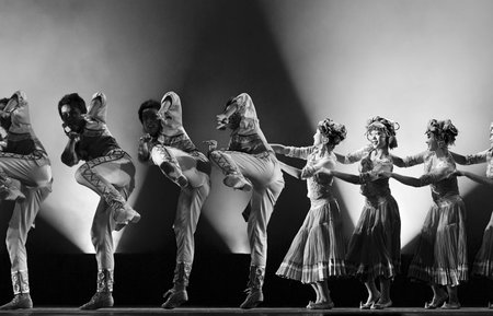 CHENGDU - DEC 15: Chinese ethnic dancers perform group dance on stage at JINCHENG theater in the 7th national dance competition of china on Dec 15,2007 in Chengdu, China.のeditorial素材