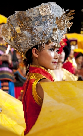 CHENGDU - SEP 26: chinese Yi ethnic dancer performs on stage at JIAOZI theater.Sep 26,2010 in Chengdu, China.のeditorial素材
