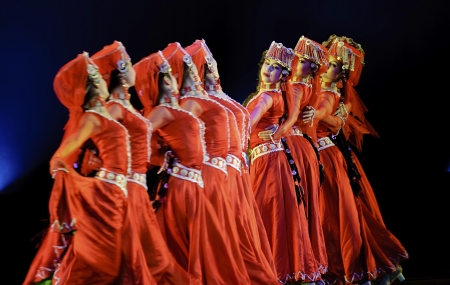 CHENGDU - DEC 15: Uigur group dance performed by Xinjiang Institute of the Arts School of Dance at JINCHENG theater in the 7th national dance competition of china on DEC 15,2007 in Chengdu, China.のeditorial素材