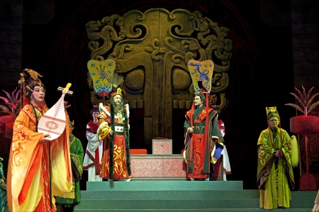 CHENGDU - JUN 6: Chinese Gaojia Opera performer make a show on stage to compete for awards in 25th Chinese Drama Plum Blossom Award competition at Jinsha theater.Jun 6, 2011 in Chengdu, China.
Chinese Drama Plum Blossom Award is the highest theatrical awaのeditorial素材