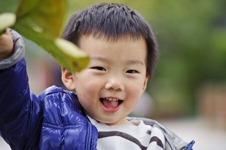 a happy baby is playingの写真素材