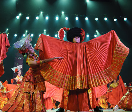 CHENGDU - SEP 26: chinese Yi ethnic dancers perform on stage at JIAOZI theater.Sep 26,2010 in...