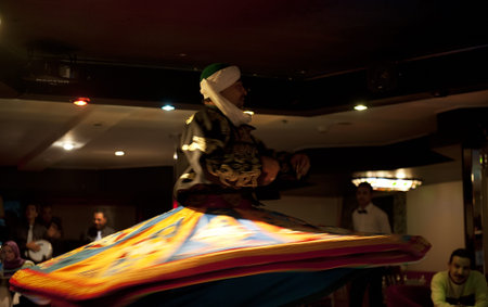 CAIRO - JAN 27: Egyptian traditional Sufi dancer performing on a yacht in River Nile.Jan 27,2013 in...