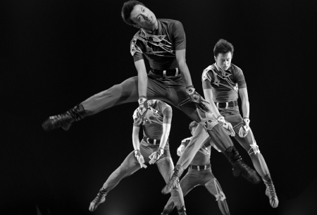 CHENGDU - DEC 11: jumping modern dancers performed by Fighting art Troupe at JINCHENG theater in the 7th national dance competition of china on DEC 11,2007 in Chengdu, China.のeditorial素材