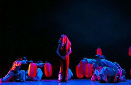 CHENGDU - APR 11: Art Institute of Xihua University perform modern dance "Dead Water Ripples" at sichuan song and dance theater in the new works for 2013 dance competition in Sichuan.Apr 11,2013 in Chengdu, China.のeditorial素材