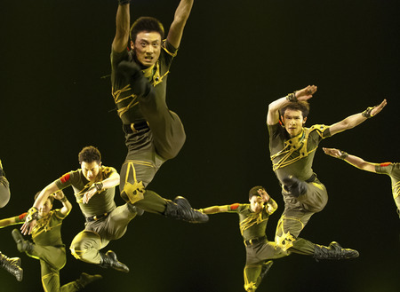 CHENGDU - DEC 11: jumping modern dancers performed by Fighting art Troupe at JINCHENG theater in the 7th national dance competition of china on DEC 11,2007 in Chengdu, China.のeditorial素材