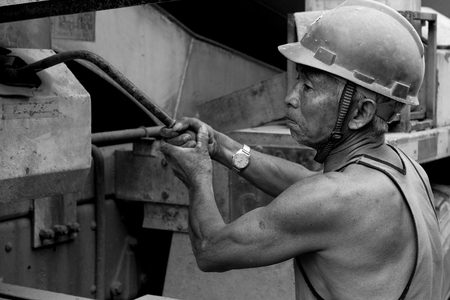hardworking laborer on construction siteの写真素材