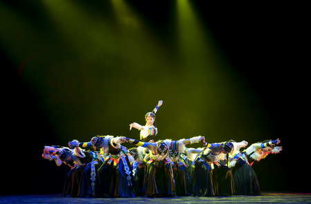 CHENGDU - APR 11: Mianyang Arts theatre perform national dance "dream of pilgrim road" at sichuan song and dance theater in the new works for 2013 dance competition in Sichuan.Apr 11,2013 in Chengdu, China.のeditorial素材