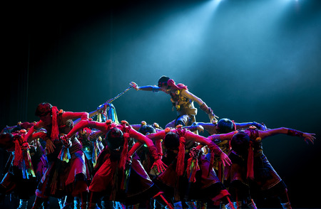 CHENGDU - APR 12: Southwest University for Nationalities College of Art perform tibetan national dance "Boat of the plateau" at sichuan song and dance theater in the new works for 2013 dance competition in Sichuan.Apr 12,2013 in Chengdu, China.のeditorial素材