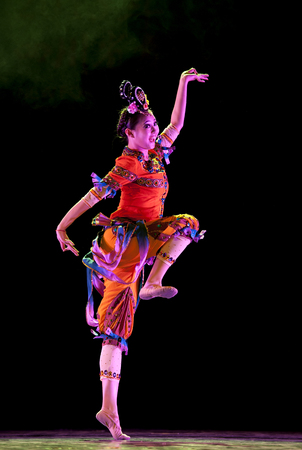 CHENGDU - APR 12, 2013: Uighur national solo dance "Loulan reverberation" performed by Art Institute of Sichuan University at sichuan song and dance theater in the new works for 2013 dance competition in Sichuan.のeditorial素材