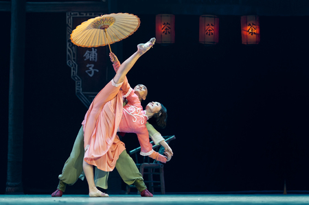 CHENGDU - APR 10: Sichuan song and dance troupe perform the dance drama "Sichuan Tea House" at Jincheng theater .のeditorial素材
