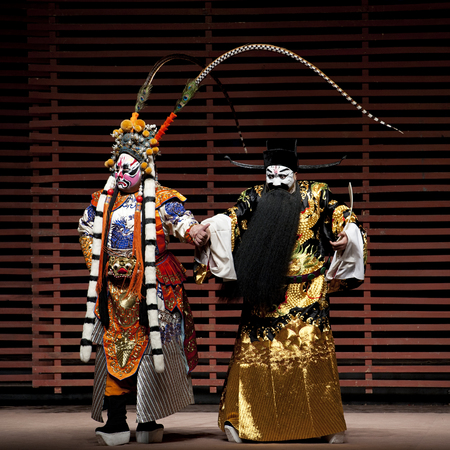 CHENGDU - NOV 25: chinese traditional opera actors perform on stage at Jiaozi theater.のeditorial素材