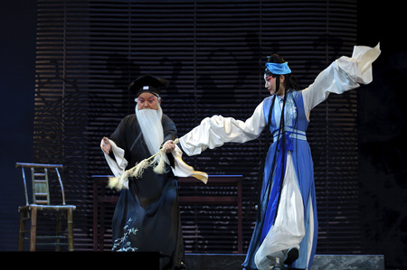 CHENGDU - FEB 14: chinese Sichuan traditional opera actors perform on stage at Sichuan opera theater.のeditorial素材