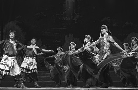 CHENGDU - SEP 27: chinese Tibetan ethnic dancers perform on stage at Sichuan experimental theater.のeditorial素材