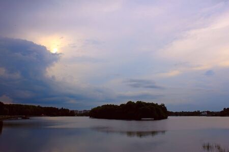 Sunset over the city reservoir. Khmelnytsky, Ukraineの写真素材