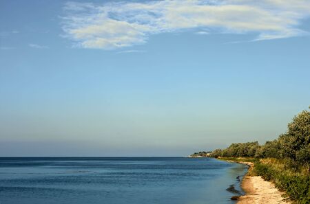 Bank of the Dnieper-Bug estuary. The view from the side of Kinburn Spit, near Ochakiv, Ukraine (horizontal)の写真素材
