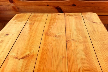 Fragment of summer wooden table with new lacquered planks の写真素材