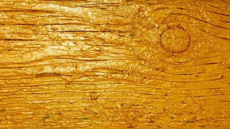 Detail of old wooden planks covered with several layers of paintの写真素材