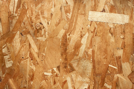 Wooden texture. Small pieces various thin plywood glued together as a monolithic board