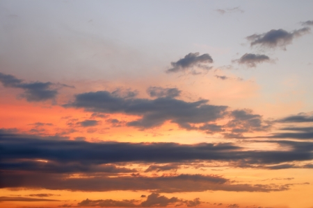 Heaven at sunset. Colorful cloudscape illuminated by the rays of setting sunの写真素材