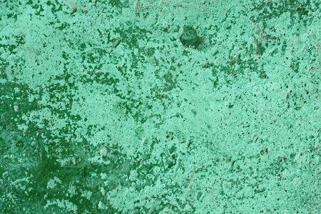 Fragment of concrete blocks painted in turquoise colorの写真素材