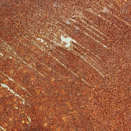 Detail of rusty sheet metal with the pain remnantsの写真素材