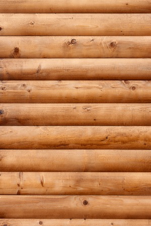 Shield with a large number of rounded parallel wooden planks as a logsの写真素材