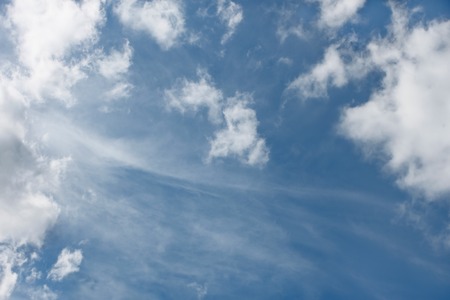Cloudscape with different types of white cloudsの写真素材