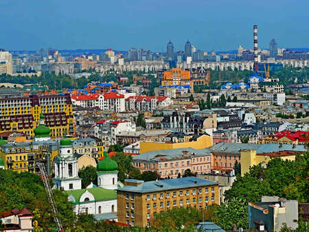 City of Kyiv in sunny summer day, cityscape captured with a long-focus lensの写真素材