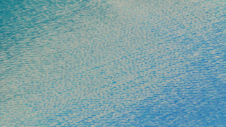 Abstract background with wavy diagonal structure in warm blue and turquoise shades as denim textured retro fabricの写真素材