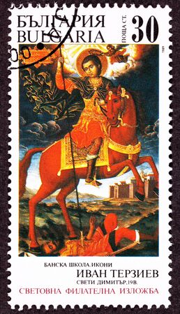 Saint Demetrius on horseback spearing the gladiator Lyaeos.  Painted by Bulgarian artist Ivan Terzievの写真素材