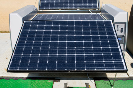 Collapsible solar power system.  Panels fold up into case for easy transport.