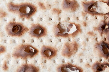 Close up of a piece of matza.  Macro lensの写真素材