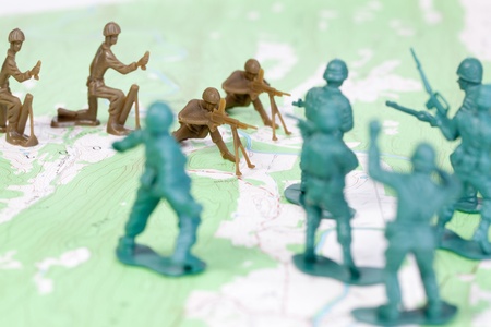 Plastic Army Men Fighting on Topographic Map. The map was produced by the U.S. Geological Survey and is in the public domainの写真素材
