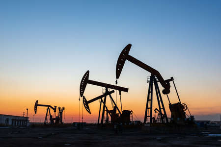 Oil pumps and stars at night, oil pumps and star tracksの写真素材
