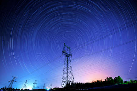Power towers and star trailsの写真素材