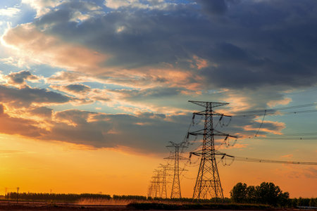 Sunset cloud power high voltage tower