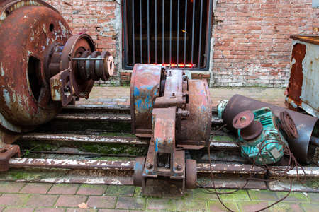 Old equipment and parts of waste cement factoryの写真素材