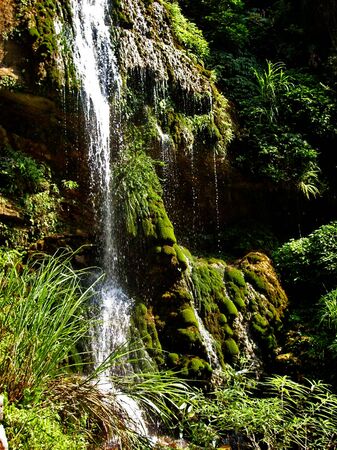 Waterfall in the mountainsの写真素材