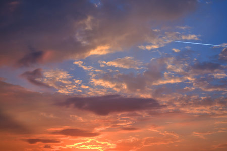 Sunset sky with clouds in the blue sky background.