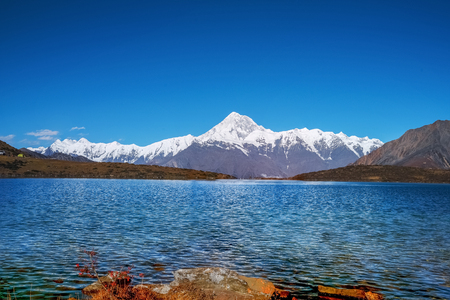 Panoramic views of plateau lakes and snow mountains in Western Sichuan Chinaの写真素材