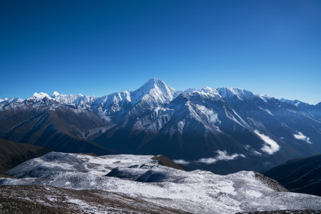 Panorama of blue sky and snow mountain in Western Sichuan Chinaの写真素材