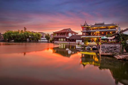 The skyline of the empty lake and ancient buildings in Suzhou Chinaの写真素材