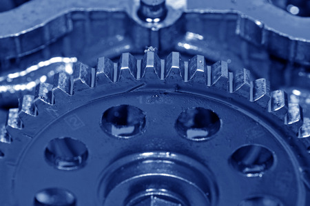 Metal gear as the background, close-upの写真素材