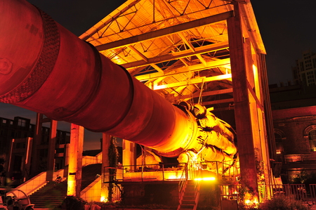 Cement plant equipment at nightのeditorial素材