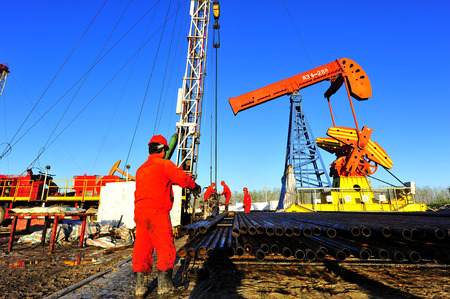 Oil field oil workers at workのeditorial素材