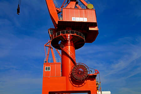 Port crane bridge and bulk carrierの写真素材